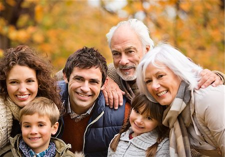 family grandmother grandfather caucasian - Family smiling together in park Stock Photo - Premium Royalty-Free, Code: 6113-06721319