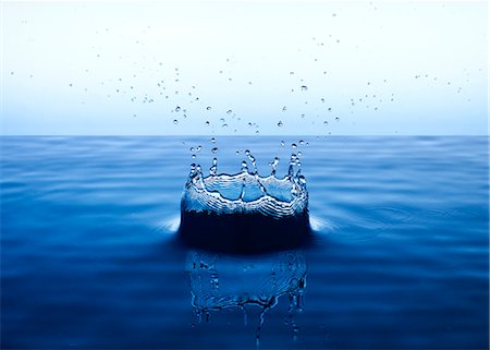 simsearch:6113-06498718,k - Close up of splashing water droplet Stock Photo - Premium Royalty-Free, Code: 6113-06721331