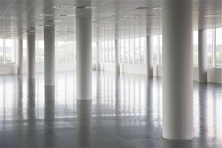 empty building interior - Pillars in empty office building Stock Photo - Premium Royalty-Free, Code: 6113-06721403