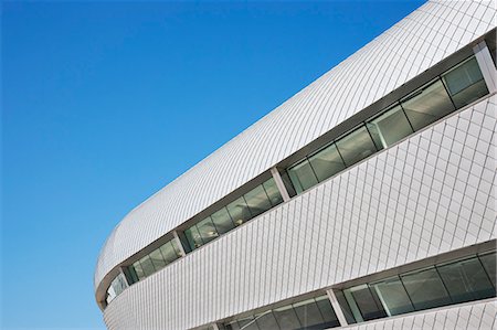 futuristic architecture - Modern building and blue sky Stock Photo - Premium Royalty-Free, Code: 6113-06721417