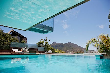 expensive modern house - Luxury swimming pool with mountain view Stock Photo - Premium Royalty-Free, Code: 6113-06898826