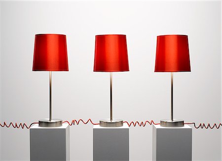 Red lamps connected by red cords Foto de stock - Sin royalties Premium, Código: 6113-06898975