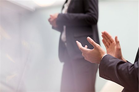 success and business - Businessman clapping Stock Photo - Premium Royalty-Free, Code: 6113-06899049