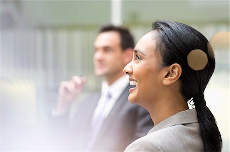 Businesswoman laughing in meeting Stockbilder - Premium RF Lizenzfrei, Bildnummer: 6113-06899017