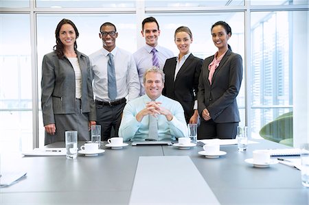 simsearch:6113-07160408,k - Portrait of smiling business people in conference room Stock Photo - Premium Royalty-Free, Code: 6113-06899150