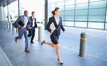 simsearch:632-06118679,k - Business people running Stock Photo - Premium Royalty-Free, Code: 6113-06899136