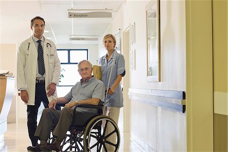 eye contact man portrait - Doctor and nurse with older patient in hospital Stock Photo - Premium Royalty-Free, Code: 6113-06908198