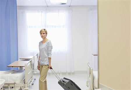 patient standing in hospital room - Patient leaving hospital room Stock Photo - Premium Royalty-Free, Code: 6113-06908206