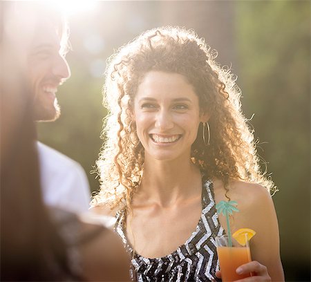 party dress - Couple having drinks outdoors Stock Photo - Premium Royalty-Free, Code: 6113-06909149