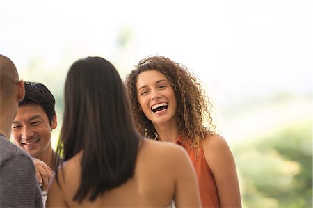 social - Friends talking at party Stock Photo - Premium Royalty-Free, Code: 6113-06909137