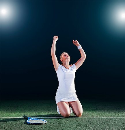 people arms up full body - Tennis player cheering on court Stock Photo - Premium Royalty-Free, Code: 6113-06909287