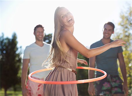 Girl hula hooping outdoors Stockbilder - Premium RF Lizenzfrei, Bildnummer: 6113-06909375