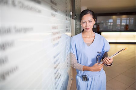 female doctor serious - Portrait of smiling nurse Foto de stock - Sin royalties Premium, Código: 6113-07146721