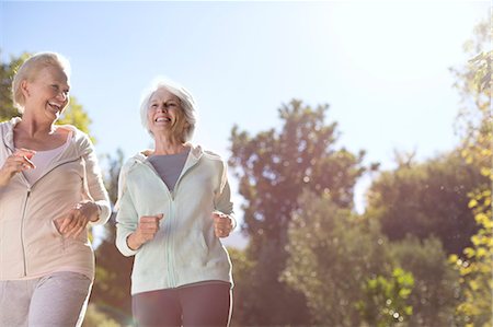 exercising park - Senior women running outdoors Stock Photo - Premium Royalty-Free, Code: 6113-07146832