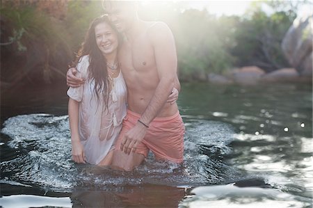 simsearch:6113-07147041,k - Friends wading in river Stock Photo - Premium Royalty-Free, Code: 6113-07147048
