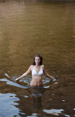 pool from above - Woman wading in river Stock Photo - Premium Royalty-Free, Code: 6113-07147122