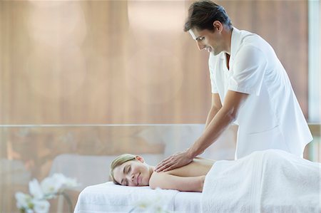 relaxation massage - Woman receiving massage at spa Stock Photo - Premium Royalty-Free, Code: 6113-07147378