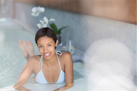 simsearch:6113-07565715,k - Woman relaxing in spa pool Stock Photo - Premium Royalty-Free, Code: 6113-07147456