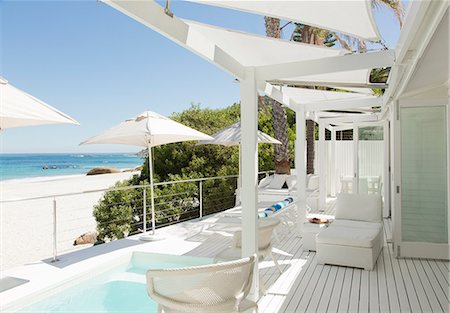 pool ocean view - Patio overlooking beach and ocean Stock Photo - Premium Royalty-Free, Code: 6113-07147520