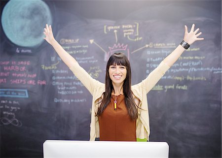 future plans - Portrait of smiling businesswoman with arms outstretched Stock Photo - Premium Royalty-Free, Code: 6113-07147965