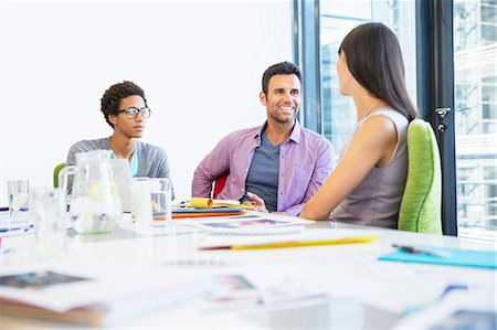 pitcher - Business people talking in meeting Stock Photo - Premium Royalty-Free, Code: 6113-07147907