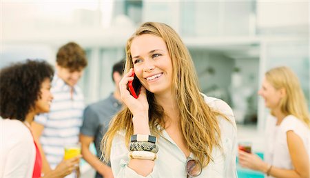 simsearch:6113-07147497,k - Woman talking on cell phone outdoors Stock Photo - Premium Royalty-Free, Code: 6113-07148008
