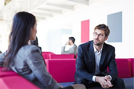 serious conversation - Business people talking in office Stock Photo - Premium Royalty-Free, Code: 6113-07159064