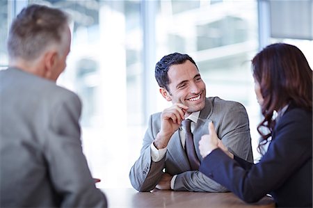 Business people talking in meeting Stock Photo - Premium Royalty-Free, Code: 6113-07159088
