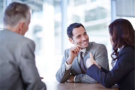 simsearch:6113-07159058,k - Business people talking in meeting Stock Photo - Premium Royalty-Free, Code: 6113-07159088