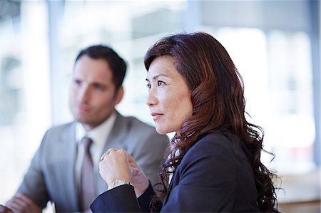 simsearch:6113-07159087,k - Business people talking in meeting Stock Photo - Premium Royalty-Free, Code: 6113-07159123