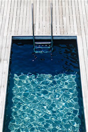 simsearch:6113-07160204,k - Wooden deck and modern lap pool Stock Photo - Premium Royalty-Free, Code: 6113-07159447