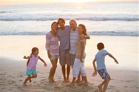 simsearch:649-06305342,k - Multi-generation family hugging on beach Stock Photo - Premium Royalty-Free, Code: 6113-07159494