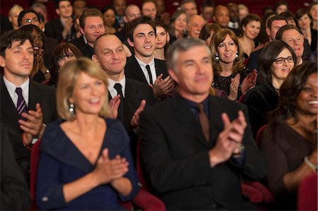 Clapping theater audience Stock Photo - Premium Royalty-Free, Code: 6113-07159407