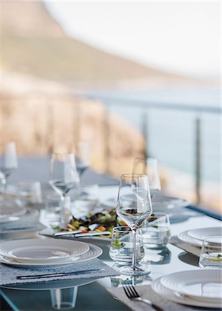 dining table nobody - Set table on luxury patio Stock Photo - Premium Royalty-Free, Code: 6113-07159438