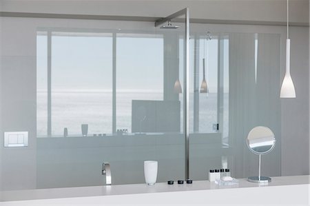 Sink and shower in modern bathroom Photographie de stock - Premium Libres de Droits, Code: 6113-07159840