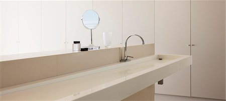 Sink and mirror in modern bathroom Stock Photo - Premium Royalty-Free, Code: 6113-07159842
