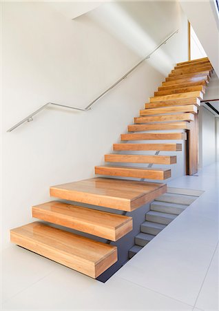 stairway nobody - Floating staircase and corridor in modern house Stock Photo - Premium Royalty-Free, Code: 6113-07159875