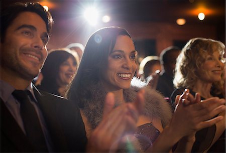 Close up of clapping theater audience Photographie de stock - Premium Libres de Droits, Code: 6113-07159998