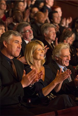 Clapping theater audience Stock Photo - Premium Royalty-Free, Code: 6113-07160123