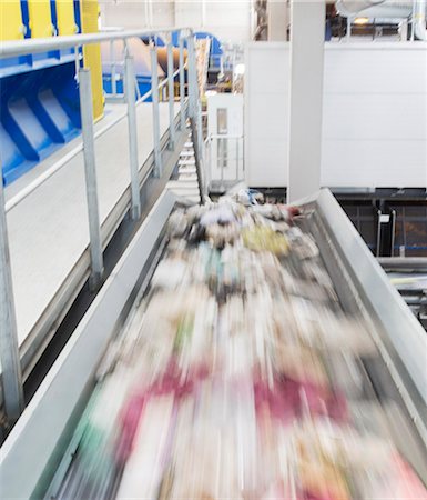 recycle center - Blurred view of conveyor belt in factory Stock Photo - Premium Royalty-Free, Code: 6113-07160270