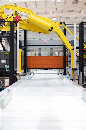 simsearch:6113-07160305,k - Robotic machinery in factory Stock Photo - Premium Royalty-Free, Code: 6113-07160326