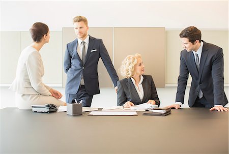 Business people talking in meeting Stock Photo - Premium Royalty-Free, Code: 6113-07160441