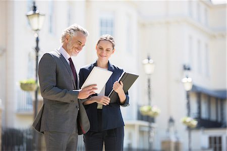 simsearch:6113-07160709,k - Business people talking on city street Stock Photo - Premium Royalty-Free, Code: 6113-07160651