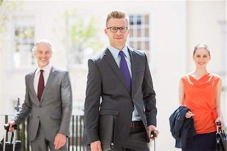 simsearch:6113-07242192,k - Business people standing outdoors Stock Photo - Premium Royalty-Free, Code: 6113-07160677