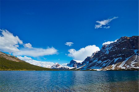 Snowy mountains overlooking glacial lake Stock Photo - Premium Royalty-Free, Code: 6113-07160754