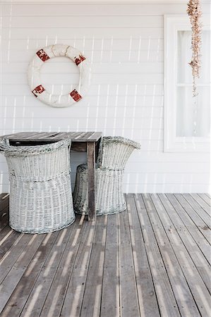 patio - Wicker chairs on deck Stock Photo - Premium Royalty-Free, Code: 6113-07160862
