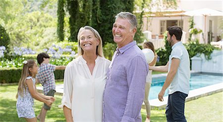 female volleyball - Senior couple in backyard with family Stock Photo - Premium Royalty-Free, Code: 6113-07241989