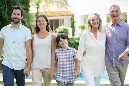 Family walking together outdoors Stock Photo - Premium Royalty-Free, Code: 6113-07241998