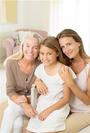 daughter and older mom - Multi-generation women smiling in bedroom Stock Photo - Premium Royalty-Free, Code: 6113-07242018