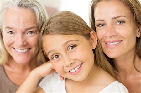 senior mom daughter - Multi-generation women smiling Stock Photo - Premium Royalty-Free, Code: 6113-07242025